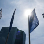 AXA Triggers Shock Move as UK Bond Confidence Splits Markets