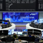 Gold Nears Record High as Geopolitical Tensions and Rate Cut Bets Drive Demand