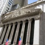 Wall Street Slips as Oil Surge and Rate Fears Trigger Market Volatility